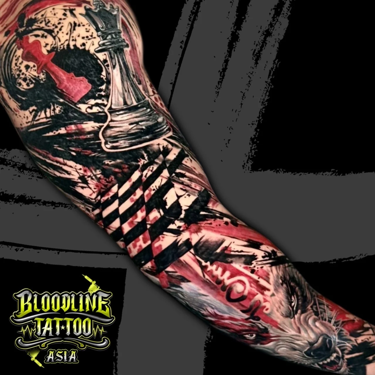 Colour trash polka arm sleeve tattoo with chess pieces, checkered patterns, and a snarling wolf in black, white, and red at Bloodline Tattoo Bangkok.