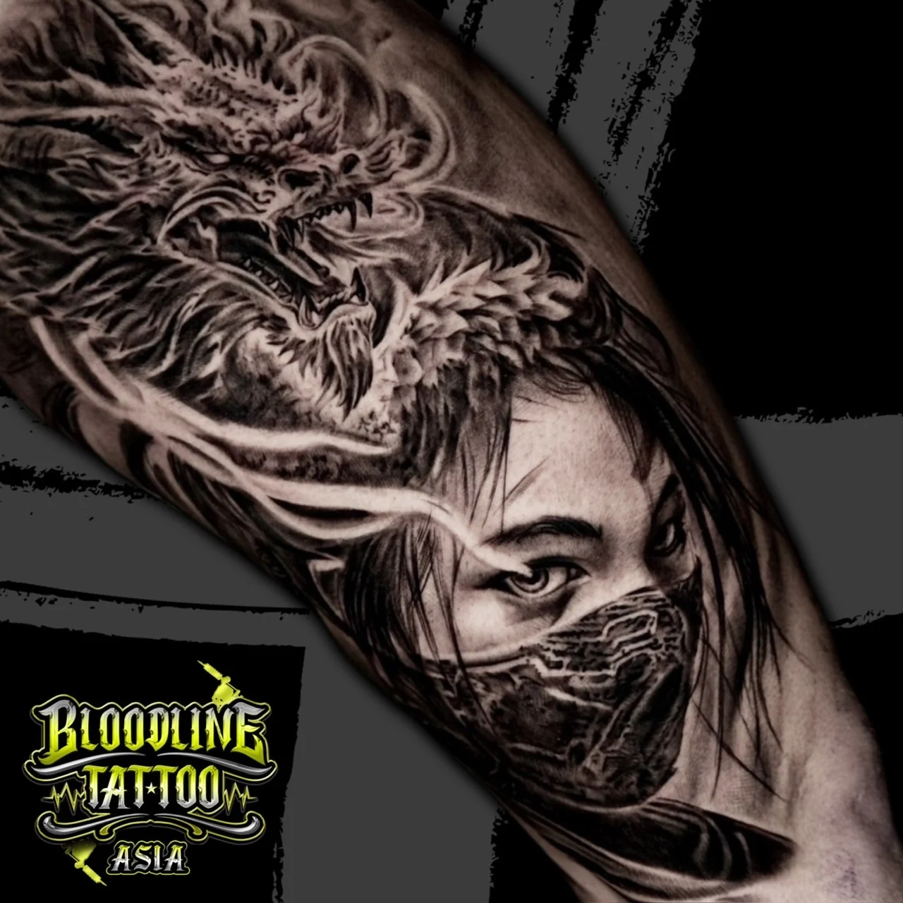 Black and grey Japanese arm tattoo of a snarling dragon above a woman's masked face in swirling smoke at Bloodline Tattoo Bangkok.